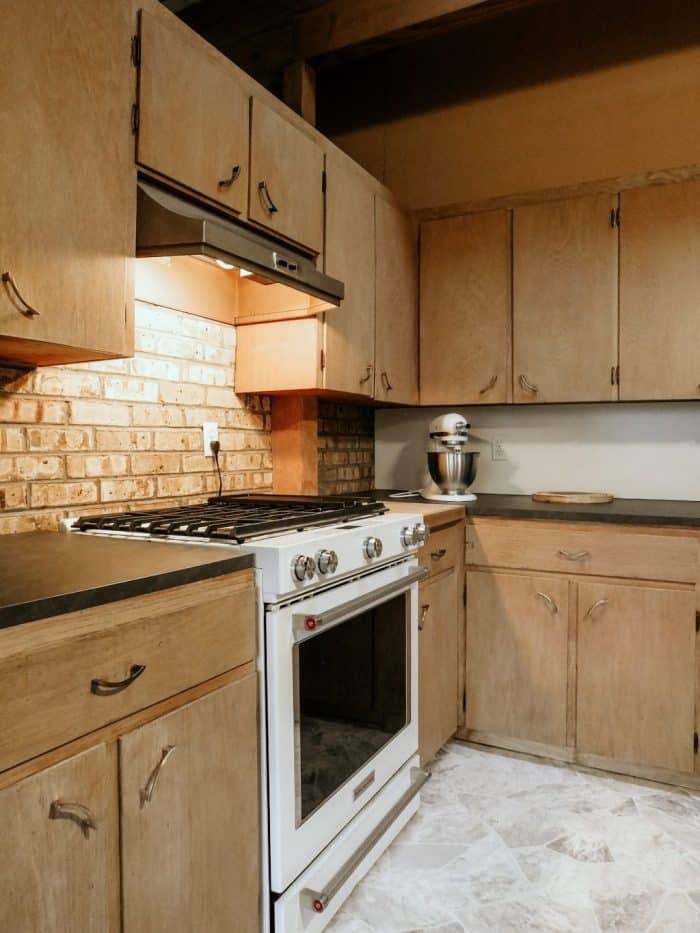 The oven, cupboards and cabinets in the kitchen.